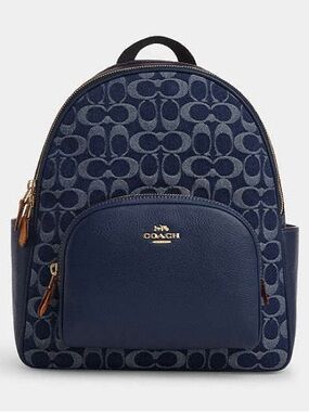 coach boysenberry backpack Court Crafted of Signature canvas and smooth leather this backpack features an interior laptop sleeve inside pockets and an outside zip pocket for ample storage Coach Court Leather Backpack in